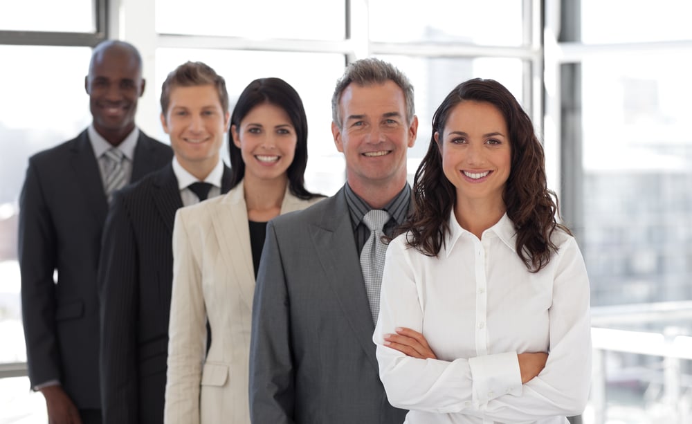 Hispanic Business woman leading a team of workers Hispanic Business woman leading a team of workers